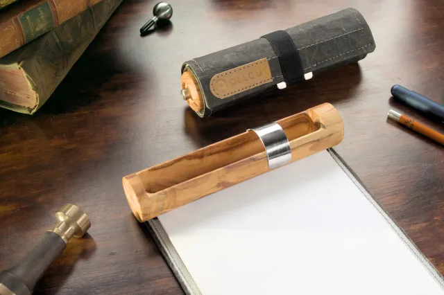 Rollgut Olive-Granite one laid flat, one rolled