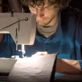 Thomas sewing Rollgut wraps on the sewing machine